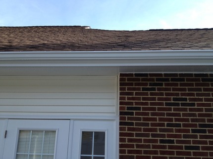 Marc’s on the Glass washing black stain and stripes from gutters in Chesterfield, VA - Restoration