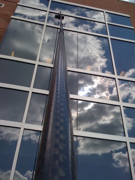 Marc’s on the Glass post construction window washing VCU Richmond VA WFP water-fed pole