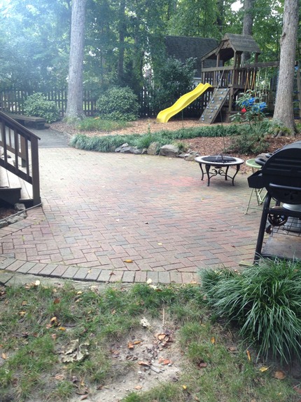 this brick patio became so dull from years of dirt, algae, and mildew growth.  power wash and soap needed to restore its beauty