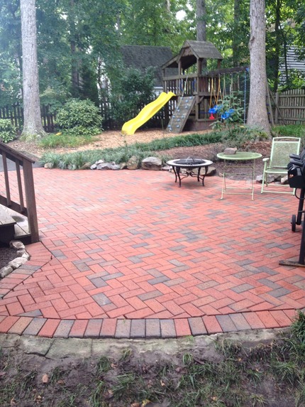 after pic of a brick patio that had old dirt, algae, and mildew on it.  look at how those colors pop again!  