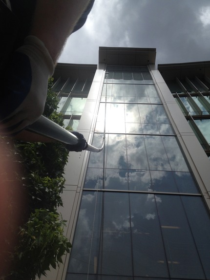 Here we are cleaning windows at University of Virginia.  The windows are 80 feet high, next to a busy street and power lines, and have a huge roof overhang.  How else can these windows get cleaned!?